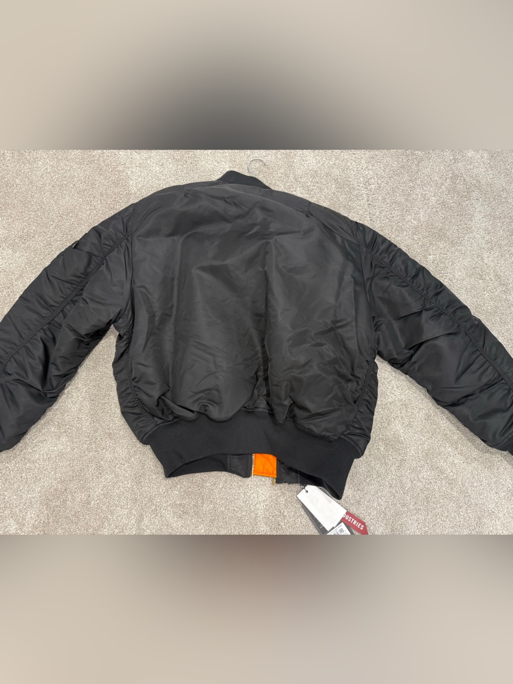 Alpha Industries Black Bomber Jacket with Orange Lining and Red Zip Tag - Picture 6 of 7